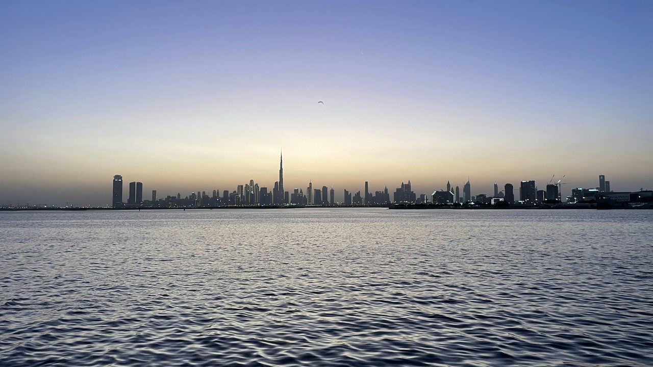 The Downtown skyline across the water from Dubai Creek Harbour