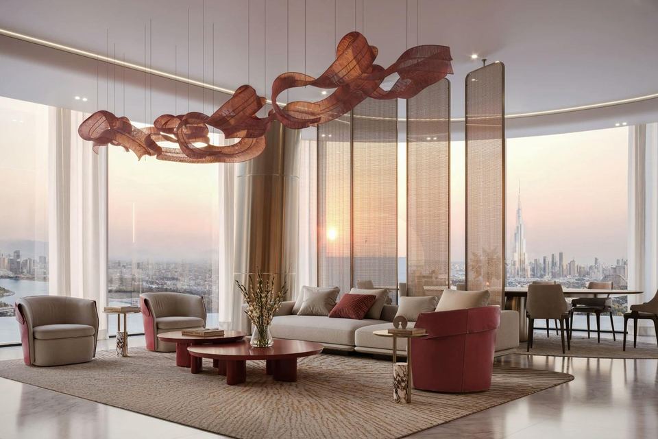 Curved living room with a sculptural ceiling piece and city views