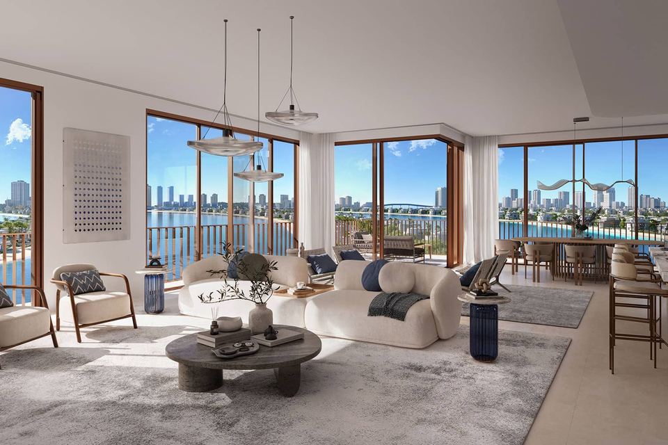 Living room with full-height glazing overlooking the water