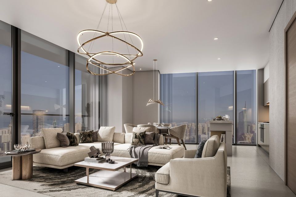 Living and dining area with city views in an Eden apartment