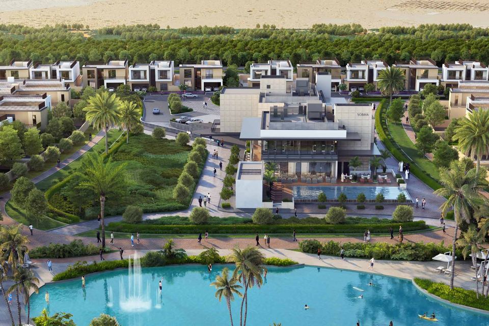 Aerial view of Sobha Elwood villas around a lagoon and clubhouse