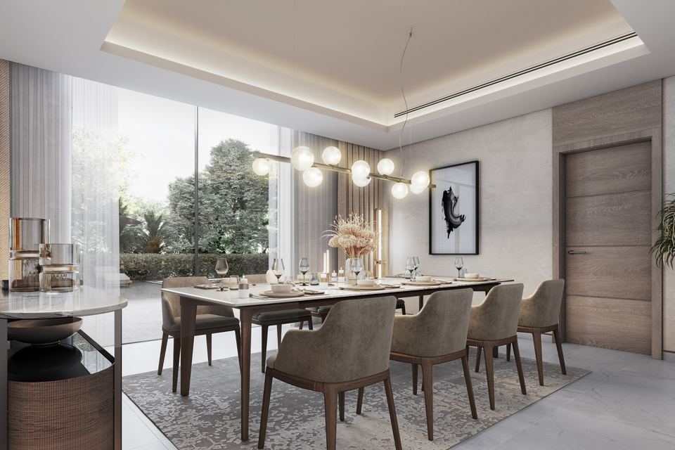 Dining room with garden view in a Sobha Elwood villa